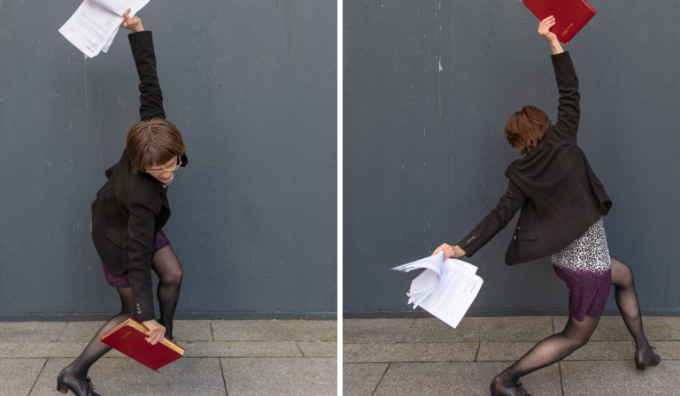 2 images of a women in a dress and blazer trying to catch a4 white pages